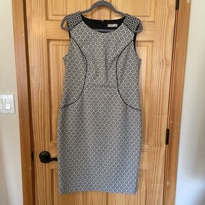 Planet sheath dress in black and white with pink highlight